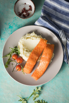 Grilled salmon fish fillet and green salad
