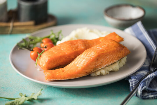 Grilled salmon fish fillet and green salad