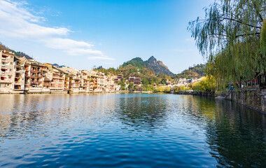 Fototapeta premium Panoramic Winter Sunset Scenery of Zhenyuan Ancient Town in Qiandongnan, Guizhou, China