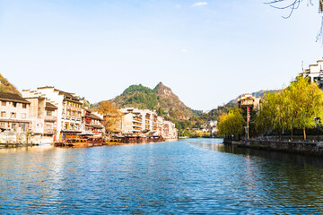 Fototapeta premium Panoramic Winter Sunset Scenery of Zhenyuan Ancient Town in Qiandongnan, Guizhou, China