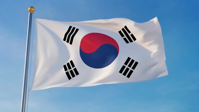 South Korean Flag Waving Gracefully in the Wind Against Clear Blue Sky in Slow Motion