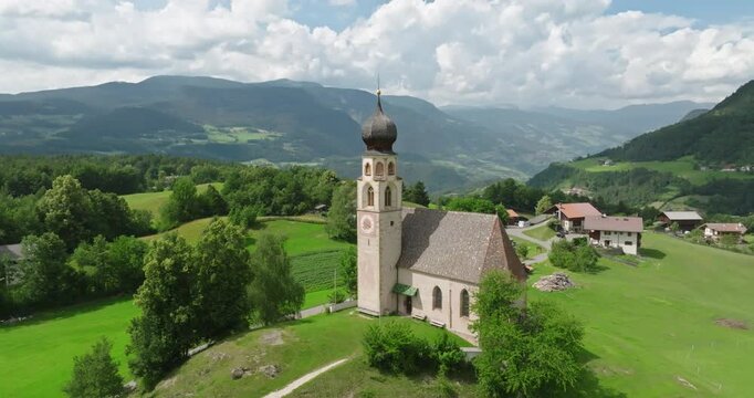 Aerial of Saint Constantine Church, Alpe di Siusi, Dolomites, Italy