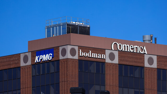 Comerica, KPMG, Bodman logos on corporate building facade