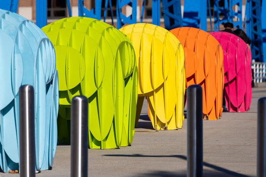 Colorful elephant sculptures lining Blue Bridge in Grand Rapids