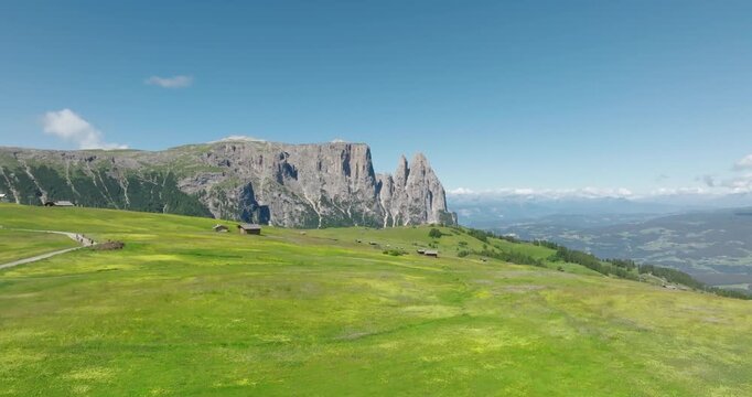 Aerial of Alpe di Siusi with the Sciliar mountains, Dolomites, Italy