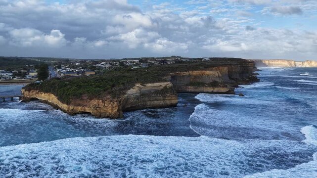 Port Campbell, Great Ocean Road, Victoria, Australia &ndash; 4K Aerial Drone Footage of Coastal Cliffs, Jetty, Ocean Waves, Creek, Seaside Townscape and Scenic Port Campbell Bay.