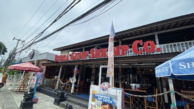 Bubba Gump Shrimp Co restaurant exterior located near Waterbom Bali with signature red lettering, nautical decor, and outdoor seating area - Bali, Indonesia, March 29, 2023