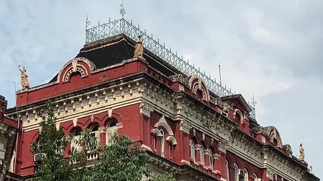 Close-up shot of the writers building the top portion in Kolkata