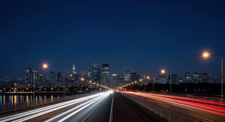 Fototapeta premium Vibrant night city skyline with light trails on highway at dusk