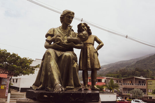 Cisneros, Antioquia, Colombia. February 27, 2022. The Parque Principal Cisneros is the monument to her mother with her children 
