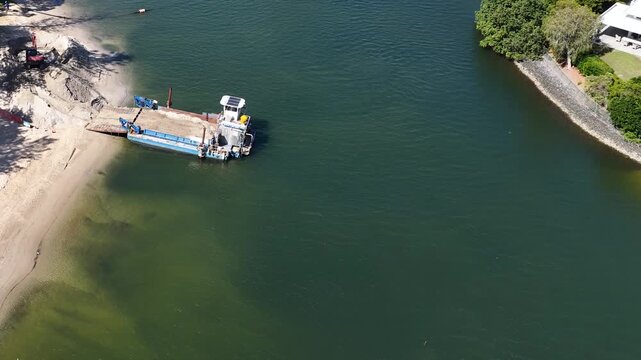 Aerial View of Dredging Barge and Excavator During Beach Nourishment Operations