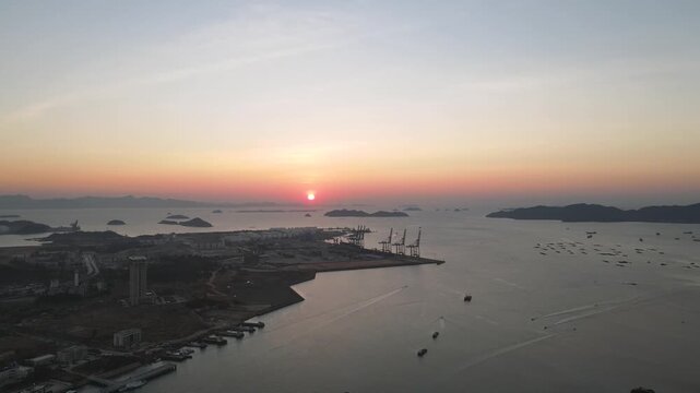 Aerial Sunset View of Coastal Container Port and Islands