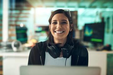 Happy woman, headphones and portrait with software engineer in office for cybersecurity service. Female person, programmer or hacker with smile for app development, programming or system maintenance