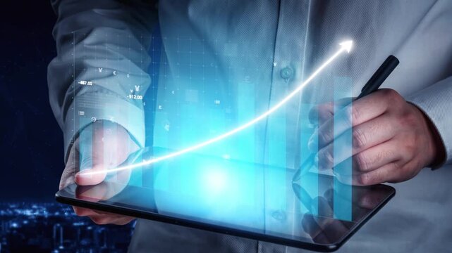 A business professional uses a digital tablet to analyze data trends, showcasing an upward graph and glowing arrows, symbolizing growth and future potential in finance. Copula