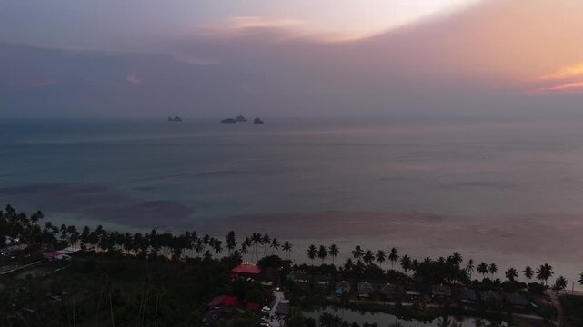 Fly sideways over Samui towards the five islands