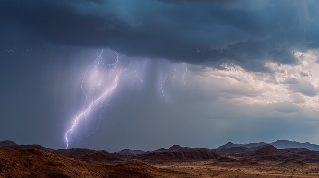 Lightning strike illuminating desert landscape during thunderstorm