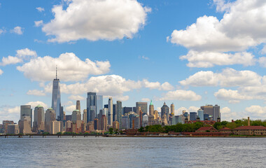 Obraz premium New York City. NYC skyline with towering skyscrapers. Manhattan and Hudson River. Panoramic cityscape of New York. Downtown NYC with landmarks. New York skyline. New York building.