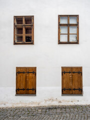 Fototapeta premium Traditional house facade with wooden windows in Sighisoara Romania
