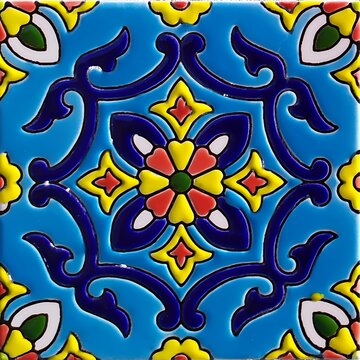 Close-up of a vibrant ornamental tile with blue swirling patterns and floral elements featuring bold colors symmetry and traditional craftsmanship in a decorative cultural design.