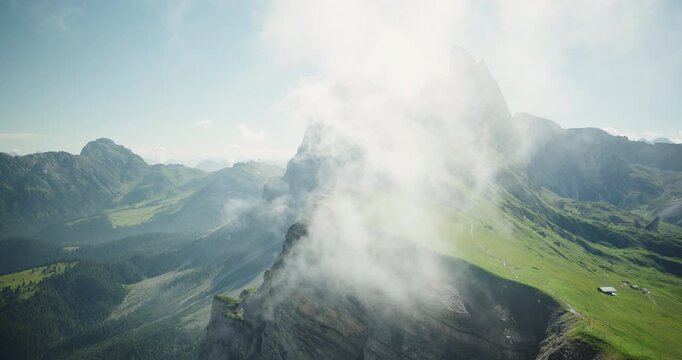 Seceda peak shrouded by clouds, Dolomites, Italy