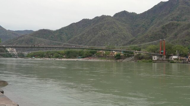 Ram Jhula Suspension Bridge over Ganges River in Rishikesh India