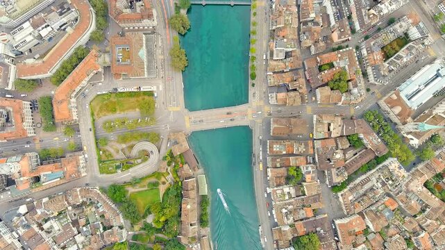 Zurich, Switzerland. Pleasure boat on the Limmat River. Summer day. Drone footage, HEAD OVER SHOT