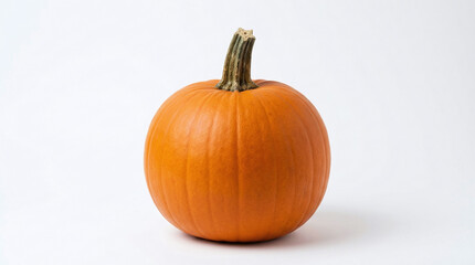 Obraz premium A single bright orange pumpkin with a textured green stem sits perfectly centered on a white background