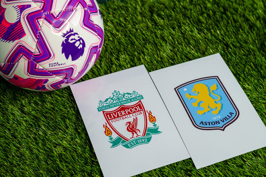 Liverpool vs. Aston Villa derby football match in Premier League. Club logo and official football ball on green soccer grass.