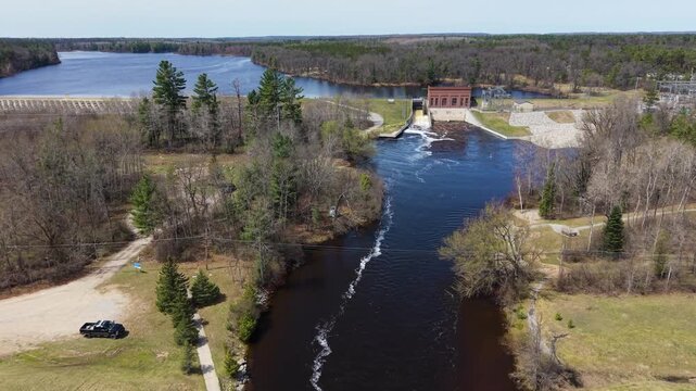Wide angle long view of Mio Dam on Au Sable River in Mio Michigan