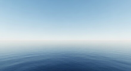 Obraz premium A serene ocean horizon dividing the deep blue sea from the clear, vast sky on a bright day.