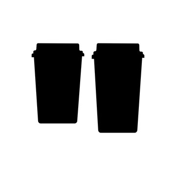 Two coffee cups with brown and white lids. The brown cup has a black lid.