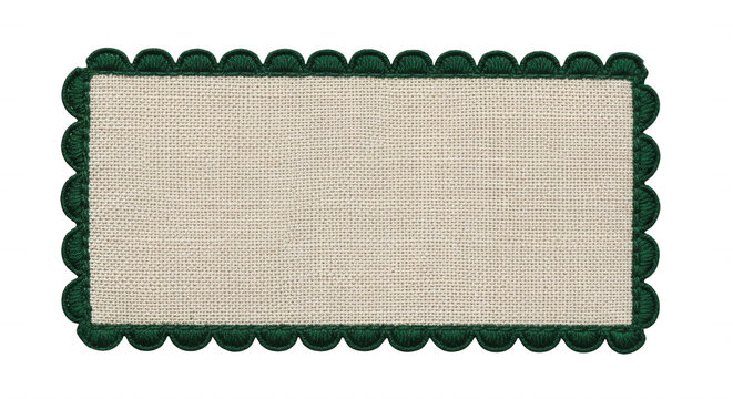 Rectangular beige linen fabric patch with a dark green scalloped crochet lace border isolated on a solid black background