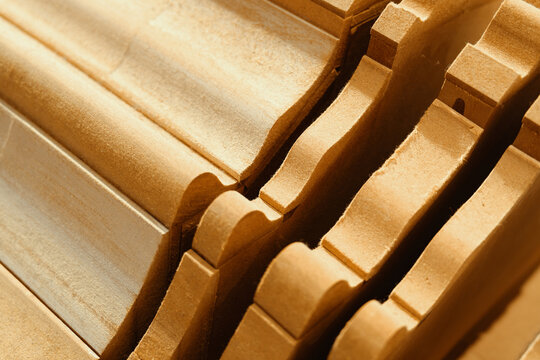 Abstract architectural detail of wooden geometric structures with repetitive patterns. Modern interior design and woodwork