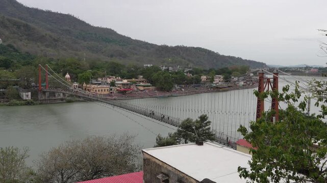 Wide View of Ram Jhula Bridge and Ganges River in Rishikesh India