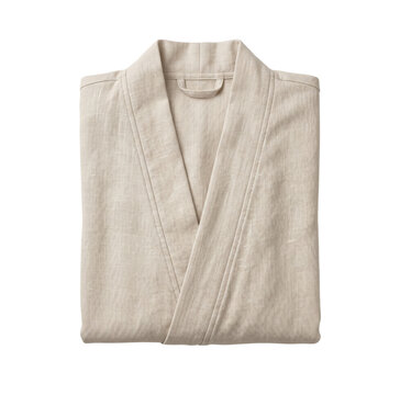 Folded beige linen bathrobe top view isolated. Spa and wellness apparel.