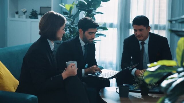 Caucasian businessman present marketing plan to smart project manager by using laptop. Skilled cooperate business team working together to brainstorm financial strategy at meeting room. Directorate.