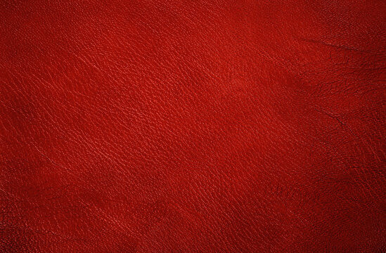 Dark red leather texture background with seamless pattern and high resolution.