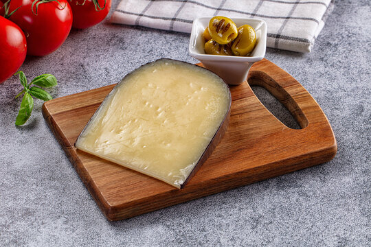 French Gruyere cheese over board