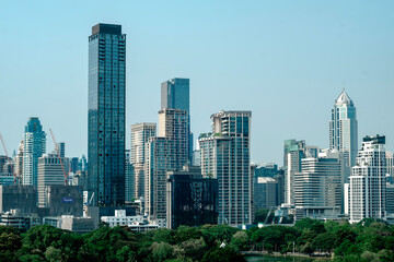 Obraz premium Bangkok Cityscape Skyline with Green Park and Luxury Skyscrapers travel Thailand