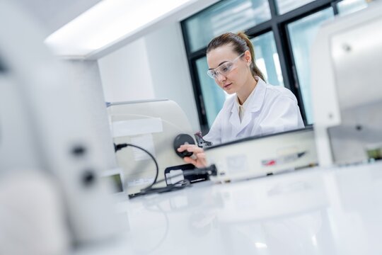 Scientist works at a lab station during a research project focused on laboratory analysis techniques and procedures