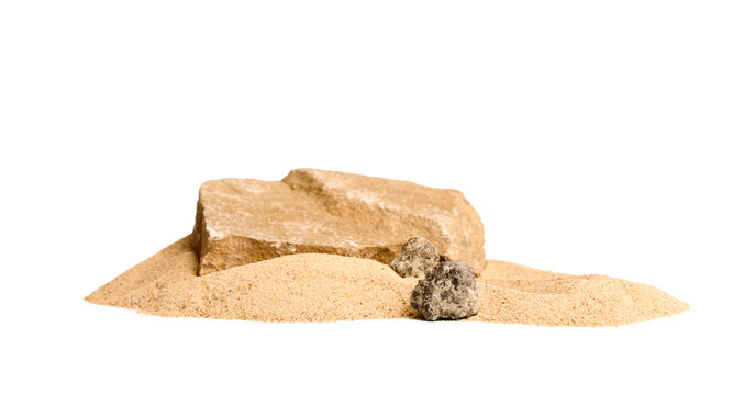 Light beach sand with stones on white background