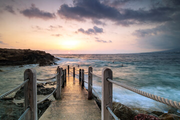 Obraz premium Sunset Over Cyprus Coastline with Golden Mediterranean Light