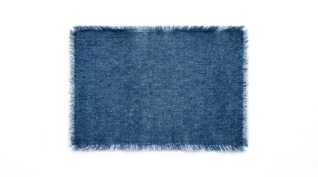 Frayed rectangular blue denim patch with raw edges, isolated on a white background, ideal for fashion and textile design concepts.