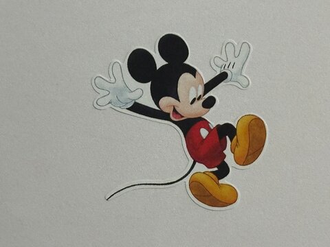 Mickey Mouse cartoon character sticker displayed on white background. May 8 2026. Alberta, Canada. For editorial use only.