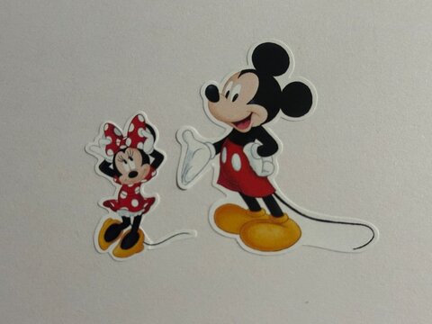 Mickey Mouse and Minnie Mouse character stickers displayed on white background. May 8 2026. Alberta, Canada. For editorial use only.