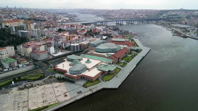 Halic Congress Center and Golden Horn Bridge fly upwards shot