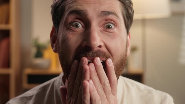 Close up excited amazed Caucasian middle-aged man saying wow open mouth big eyes surprised expression happy shocked face adult male win looking at camera with shock wonder surprise winning at home