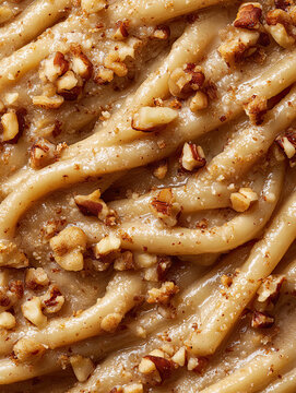 Swirled Caramel Frosting with Chopped Nuts

