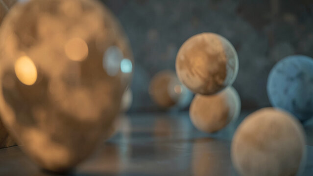 Abstract glowing spheres and orbs with soft bokeh background
