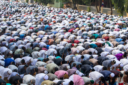 Massive Crowd of Muslim Men Performing Congregational Prayer Outdoors